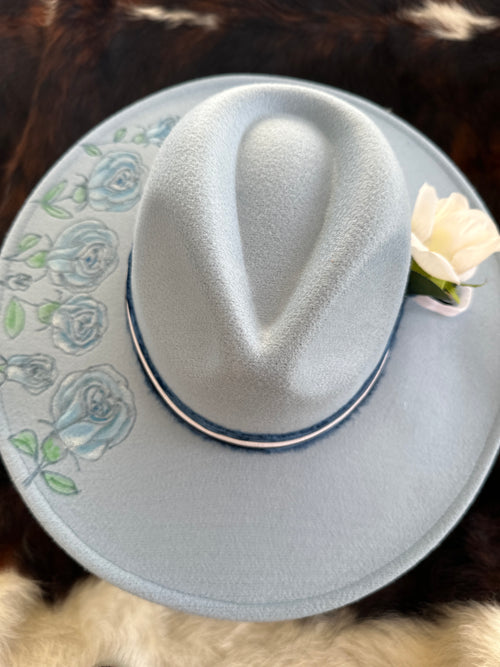 Baby blue rose garden, cowboy hat
