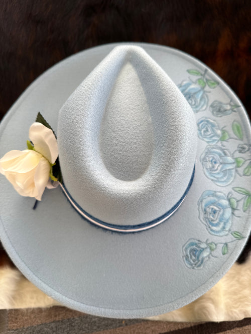 Baby blue rose garden, cowboy hat